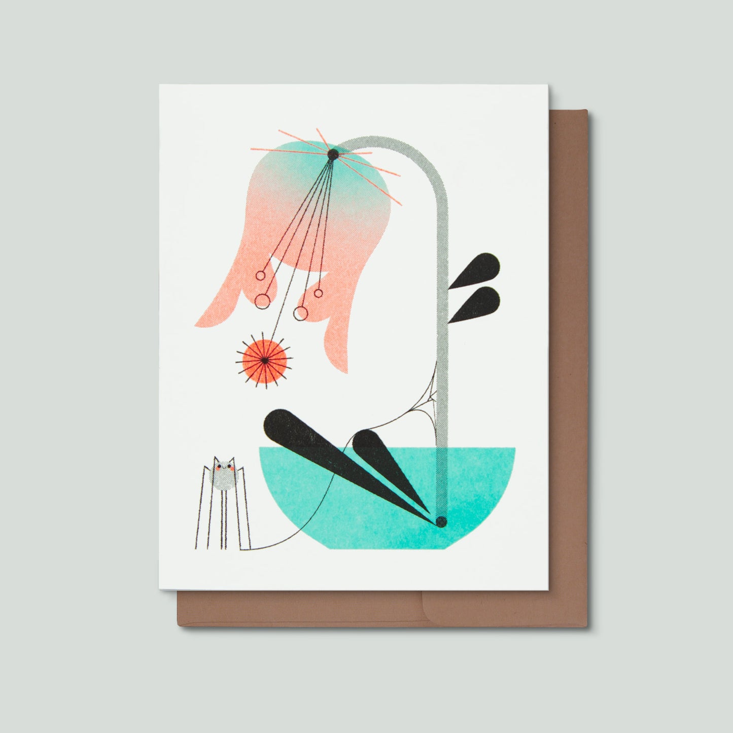 Risograph greeting card with an illustration of a pink and blue flower in a blue vase with a small spider and web with a kraft colored envelope on a light grey background.