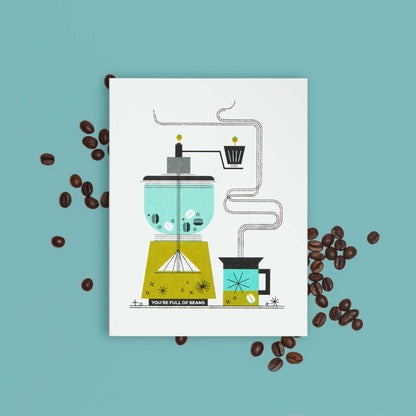 A greeting card featuring a stylized coffee making illustration with beans and the text 'YOU'RE FULL OF BEANS', displayed on a teal background with scattered coffee beans around it.