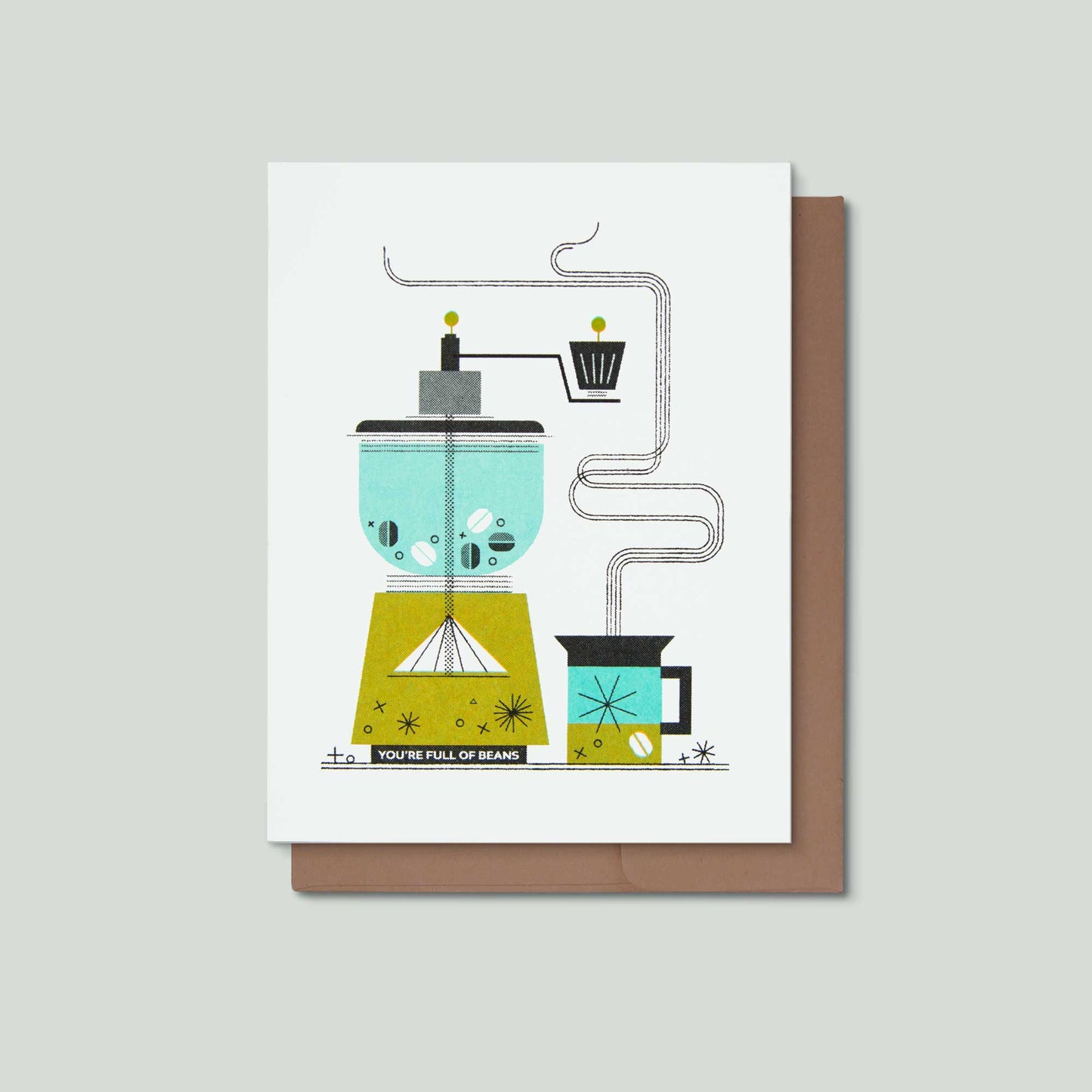A white greeting card with a minimalist coffee themed illustration, shown with a brown envelope on a light gray background. The card reads 'YOU'RE FULL OF BEANS' and features stylized coffee equipment in teal, olive green, and gray.