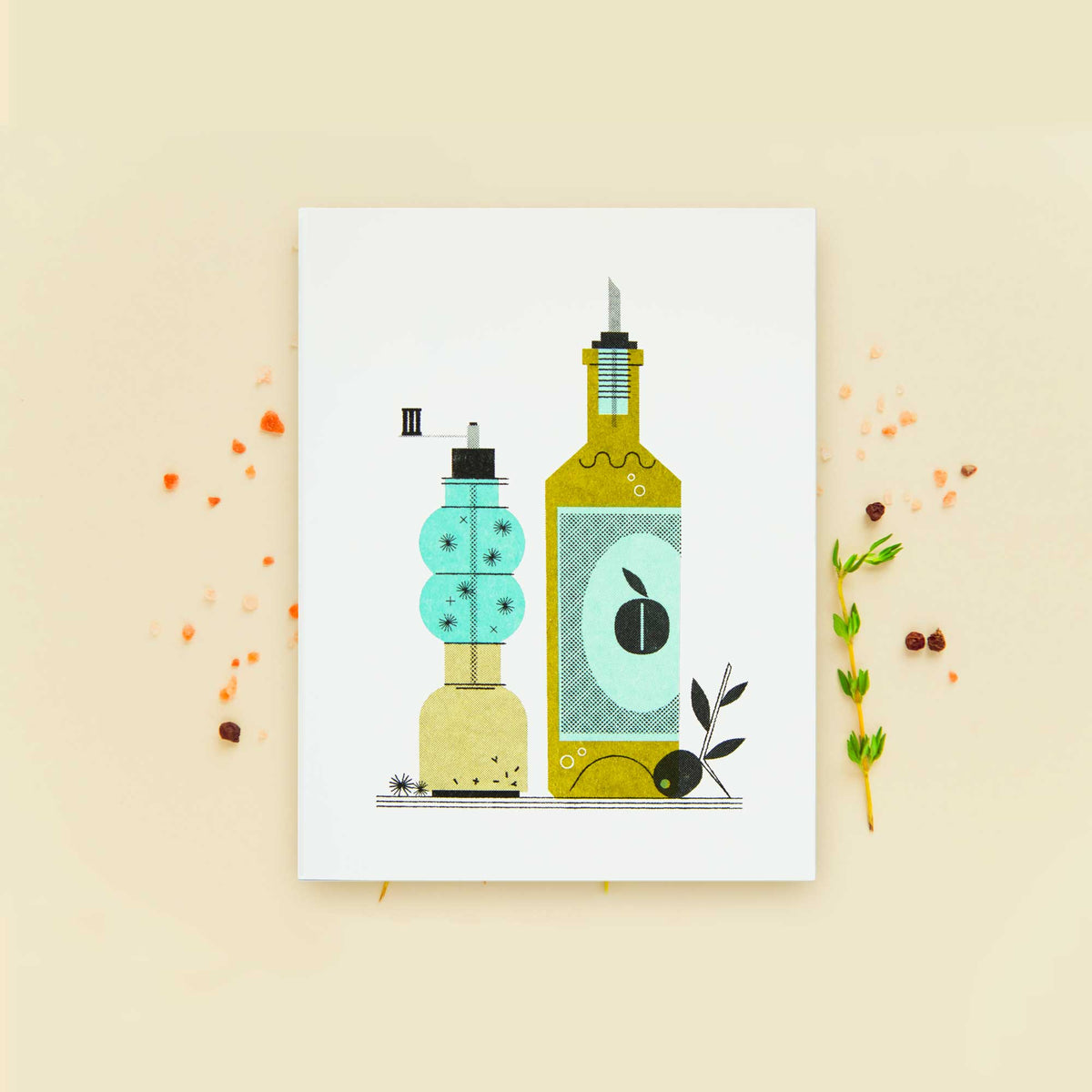 A risograph greeting card featuring a stylized illustration of olive oil & pepper bottles, one turquoise and one olive green, displayed on a cream colored backgrounf with salt, pepper, and thyme sprigs.