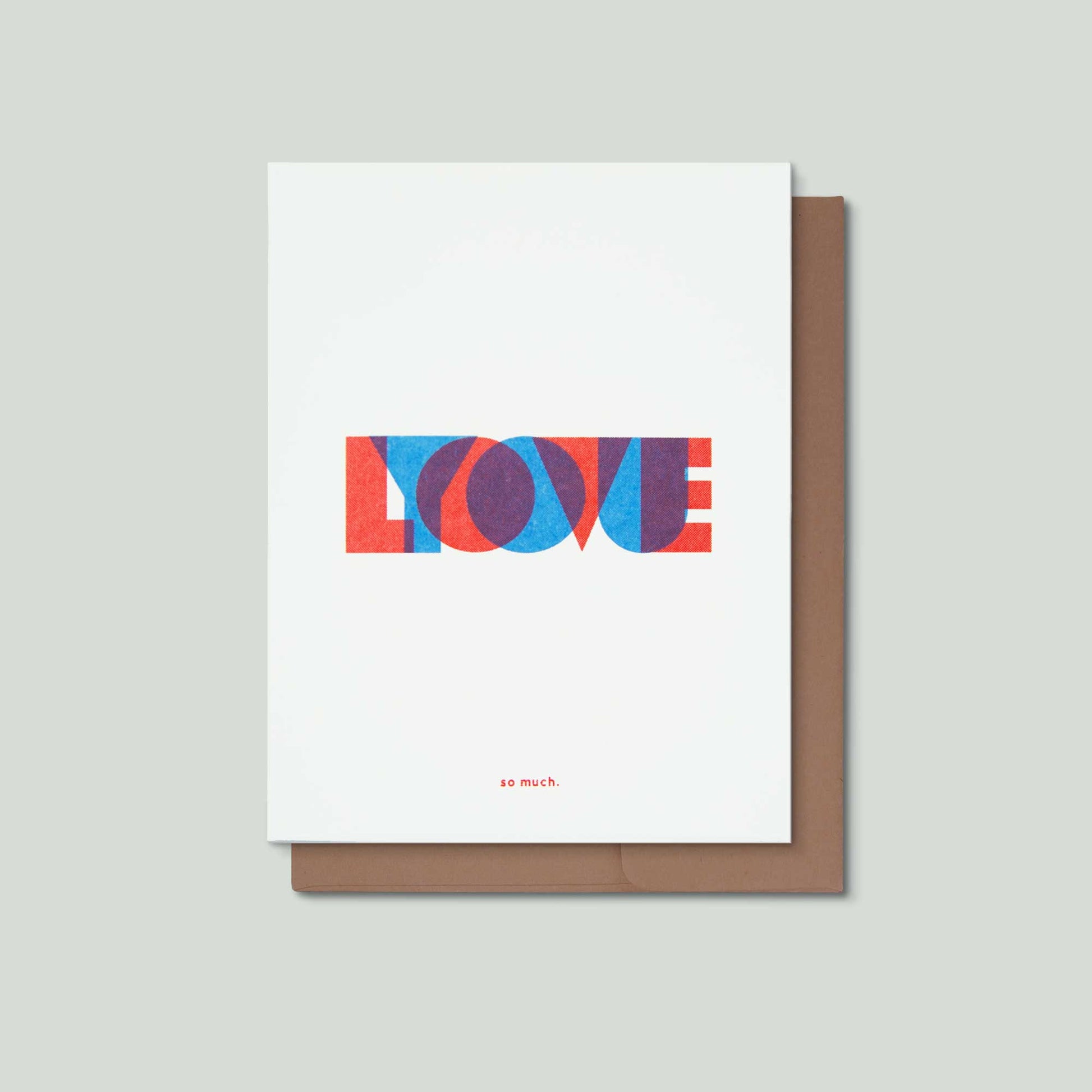 A white greeting card with the word 'LOVE' spelled out in red, and overlaying it the word "YOU" in  blue, with the phrase 'so much.' printed below in small red text.
