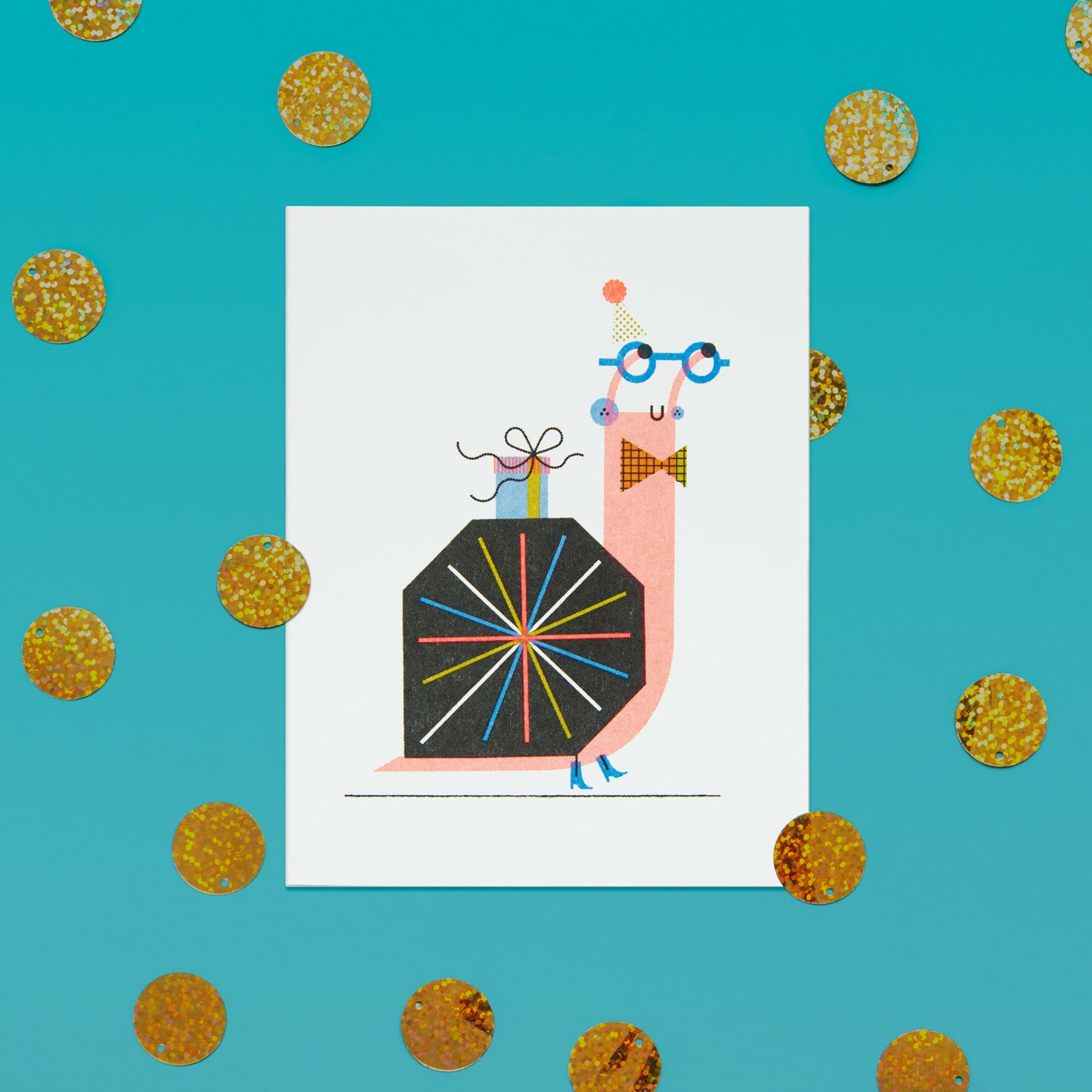 Illustration of a snail with glasses on a white greeting card against a teal background with gold polka dots