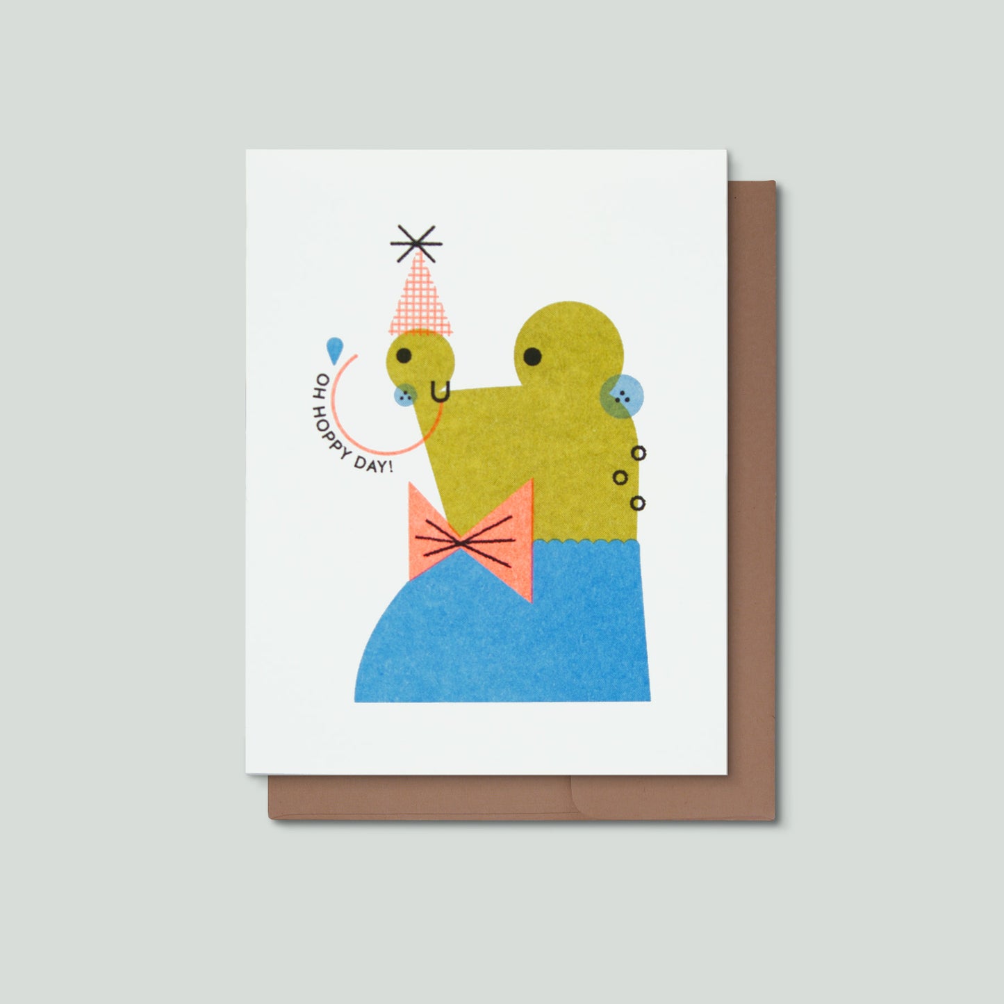 Greeting card with a colorful illustration of a frog and text that says Oh Hoppy Day on a white background