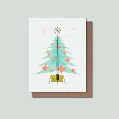 Greeting card with a Christmas tree design on a white background