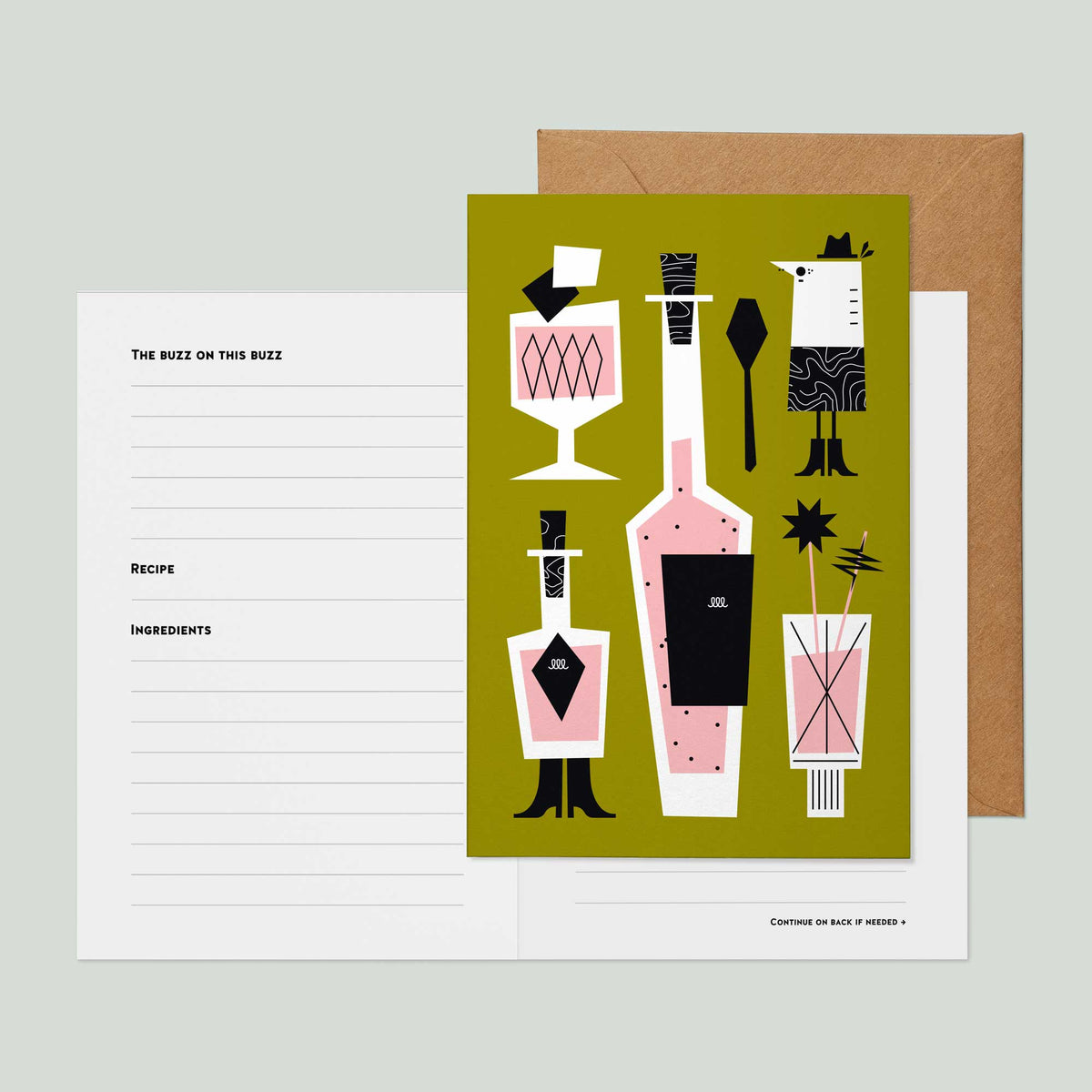 A greeting card with an illustration of cocktail bottles, glasses, and barware on an olive green background, shown with a kraft envelope and the inside of the greeting card showing recipe card lined sections on a light gray surface.